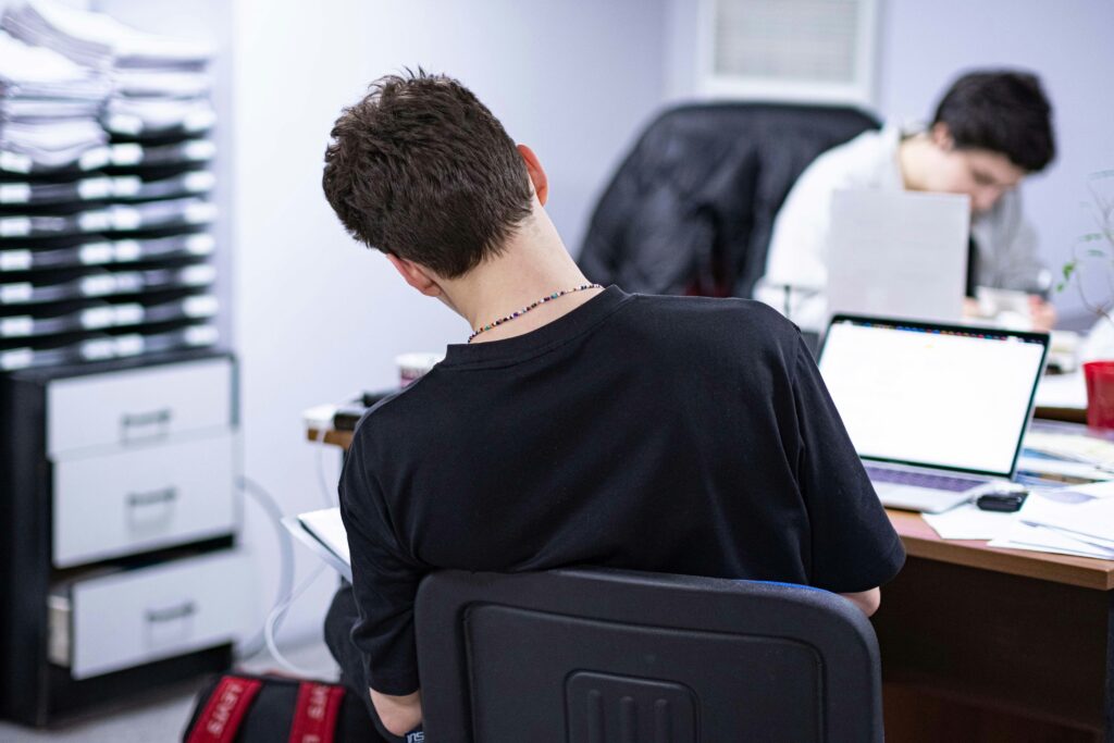 A person is working on a computer.